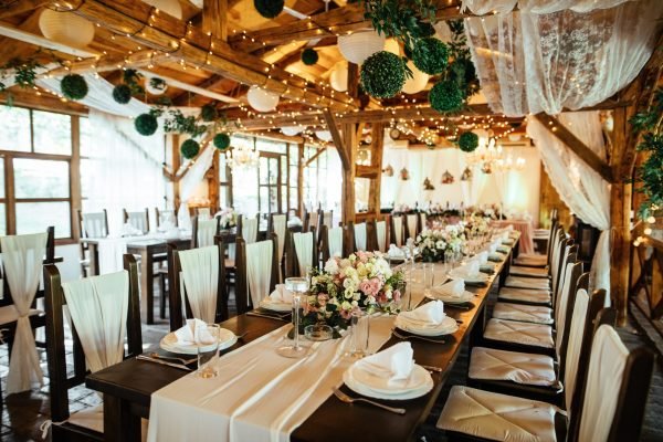 Rustic decorated indoors wedding venue.